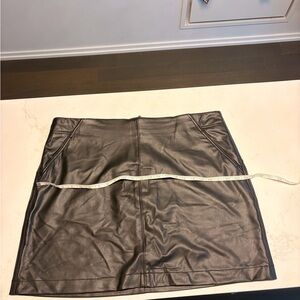 Black faux leather mini skirt